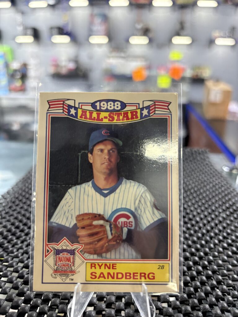 This classic 1988 All-Star Ryne Sandberg baseball card features the Chicago Cubs legend in vintage attire.