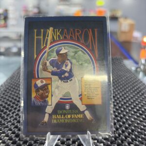 This vintage Hank Aaron Donruss Hall of Fame Diamond King baseball card is a true classic collectible.