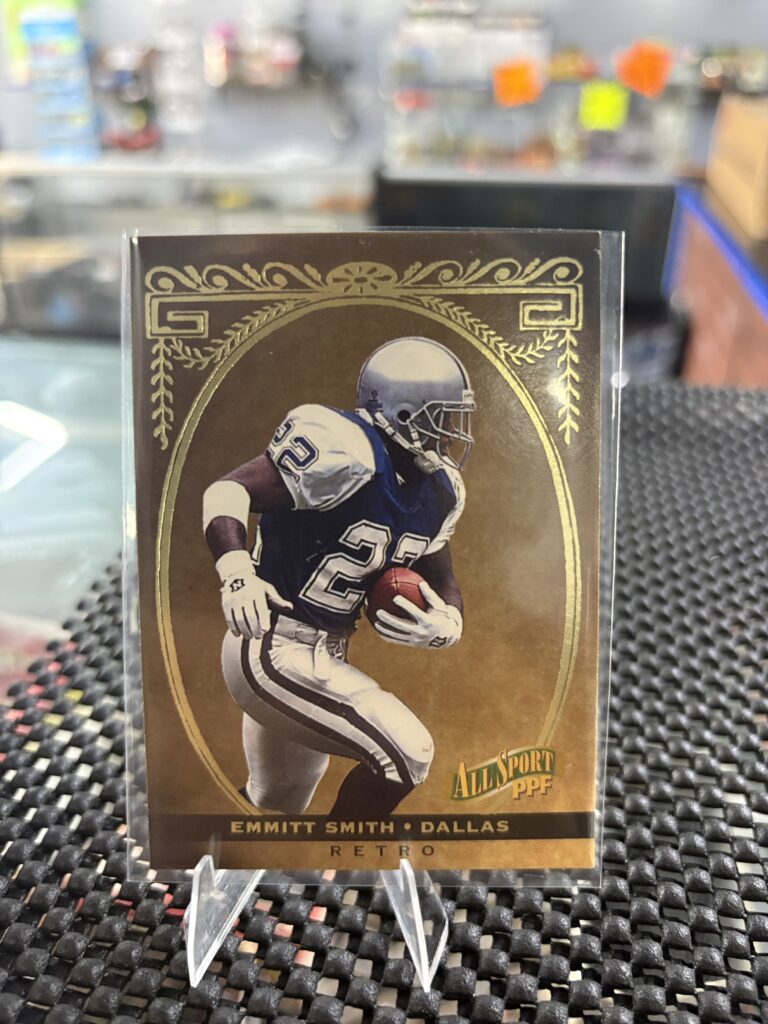 Dallas Cowboys Emmitt Smith All Sport PPF Retro football trading card, action shot in protective sleeve, high quality vintage running back player collectible in clear display case for serious football fans and investors.