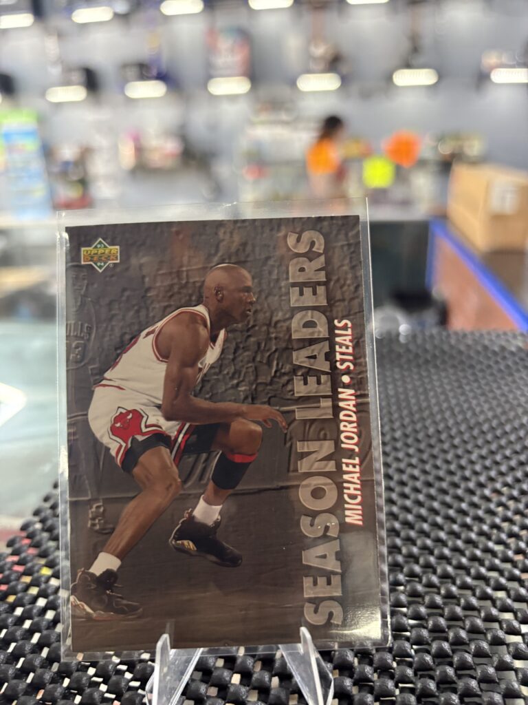 Michael Jordan Upper Deck Season Leaders Steals basketball trading card, Chicago Bulls star in protective sleeve, high quality vintage player collectible in clear display case for serious basketball fans and investors today. (