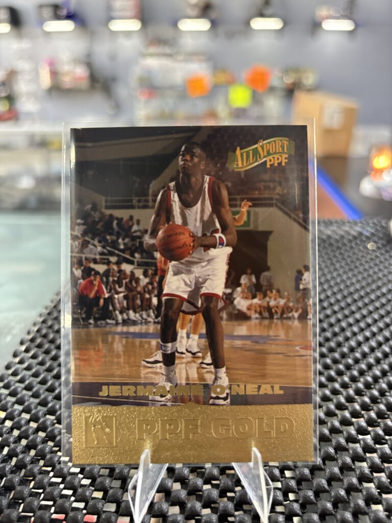 Jermaine O'Neal All Sport PPF Gold basketball trading card, action shot in protective sleeve, high quality vintage player collectible in clear display case for serious basketball fans and investors today.