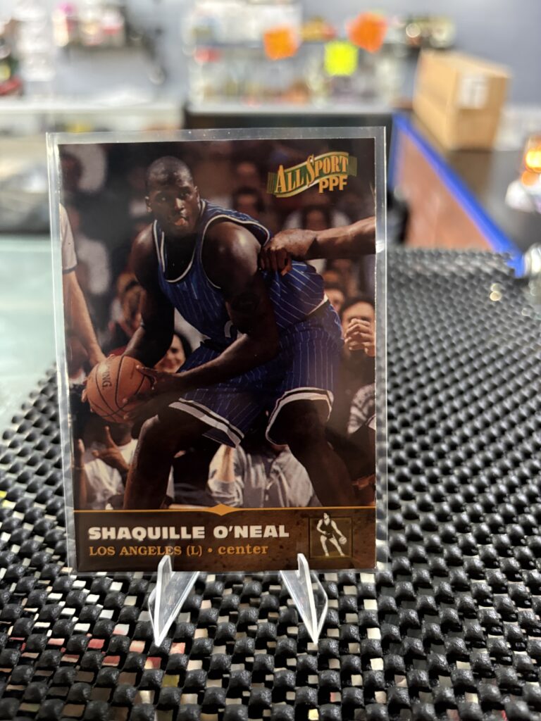 Orlando Magic era Shaquille O'Neal All Sport PPF basketball trading card, action shot in protective sleeve, high quality vintage center player collectible in clear display case for serious basketball fans and investors.