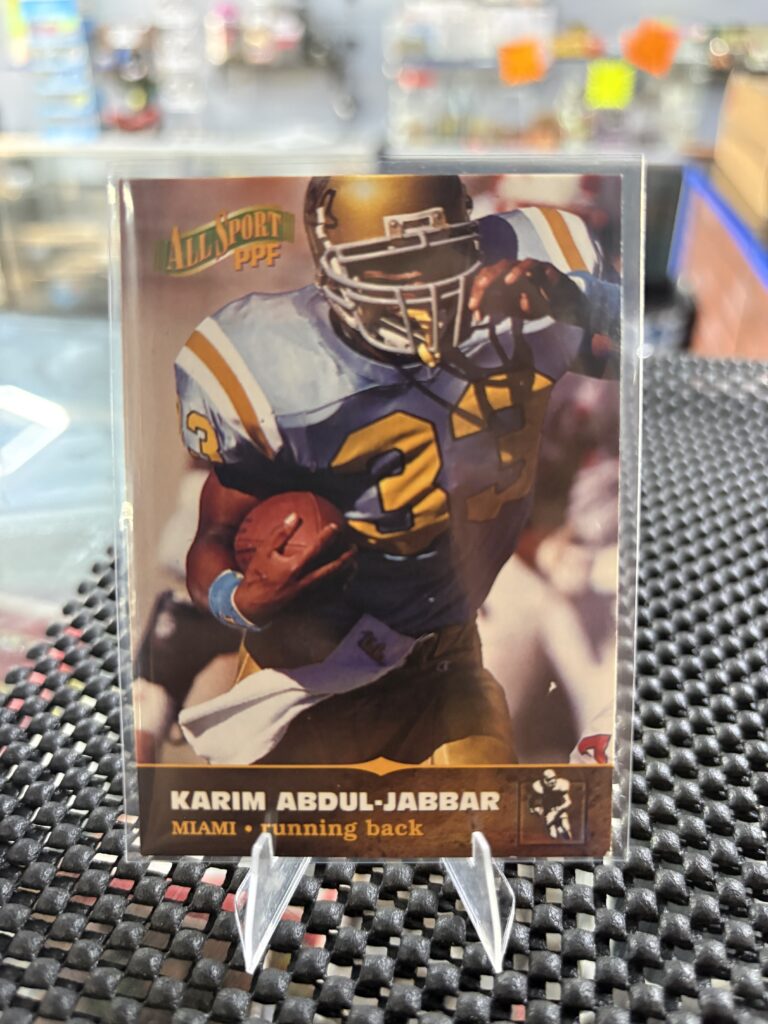 Miami running back Karim Abdul-Jabbar 1996 All Sport PPF football trading card, action shot in protective sleeve, high quality vintage NFL player collectible in clear display case.