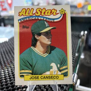 Oakland Athletics Jose Canseco Topps All-Star baseball trading card, classic portrait shot in protective sleeve, high quality vintage rare collectible in clear display case for serious baseball fans and investors today.