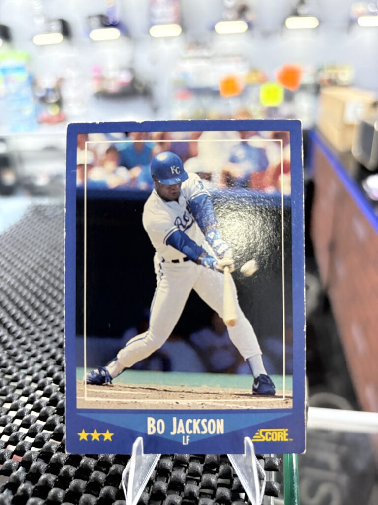Kansas City Royals Bo Jackson Score baseball trading card, powerful batting action shot in protective sleeve, high quality vintage rare collectible in clear display case for serious baseball fans and investors today.