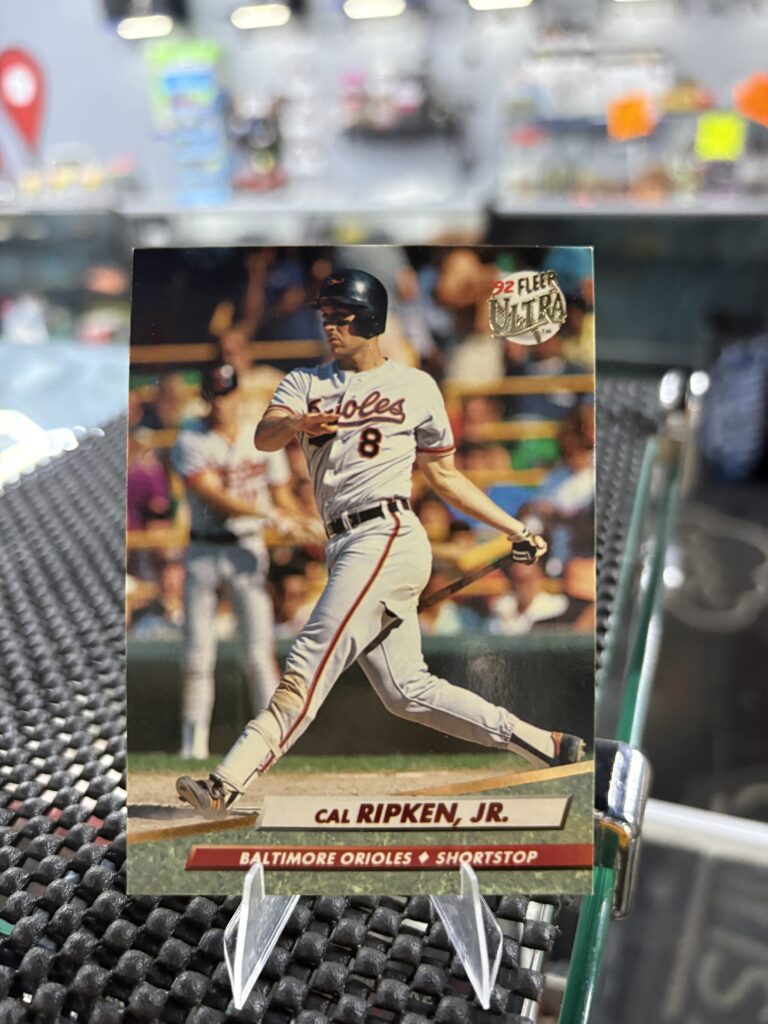 Baltimore Orioles Cal Ripken Jr. 1992 Fleer Ultra baseball trading card, action shot in protective sleeve, high quality vintage rare collectible in clear display case for serious baseball fans and investors today.