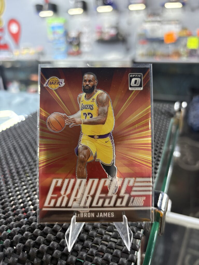 LeBron James Los Angeles Lakers Donruss Optic Express Lane basketball trading card, action shot in protective sleeve, high quality modern star player collectible in clear display case for serious basketball fans and investors today.
