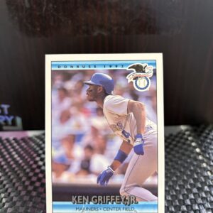 Seattle Mariners Ken Griffey Jr. 1992 Donruss baseball trading card, base running action shot in protective sleeve, high quality vintage rare collectible in clear display case for serious baseball fans and investors today.