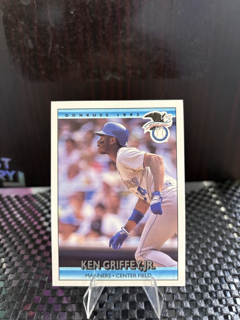 Seattle Mariners Ken Griffey Jr. 1992 Donruss baseball trading card, base running action shot in protective sleeve, high quality vintage rare collectible in clear display case for serious baseball fans and investors today.