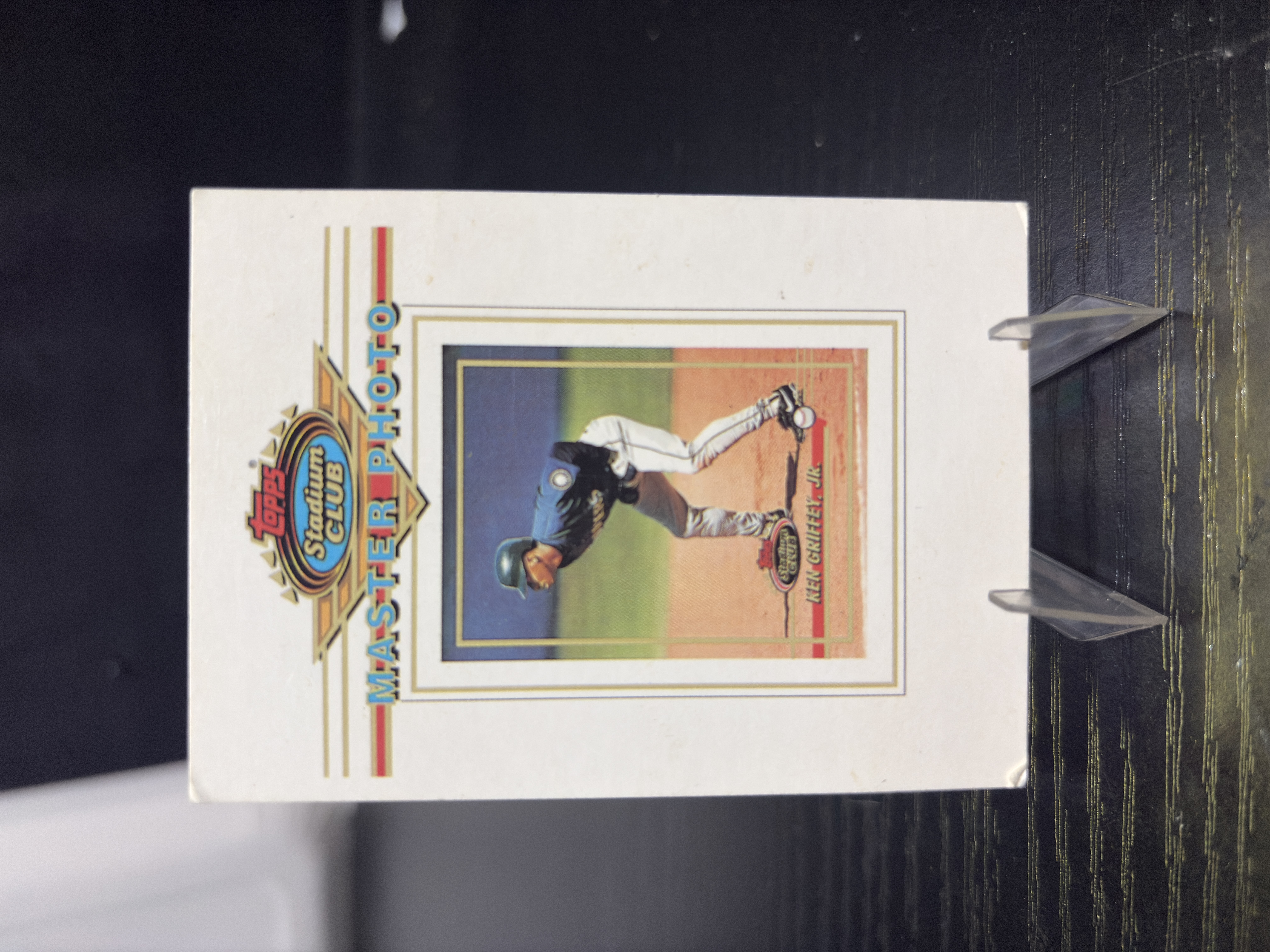 Seattle Mariners Ken Griffey Jr. Topps Stadium Club Master Photo baseball trading card, vintage portrait in protective sleeve, high quality rare collectible in clear display case for serious baseball fans and investors today.