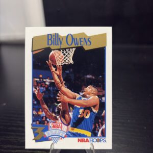 Billy Owens 1991 NBA Hoops Draft basketball trading card, action shot in protective sleeve, high quality vintage rare collectible in clear display case for serious basketball fans and investors today.