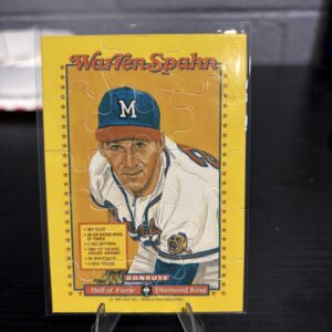 Milwaukee Braves Warren Spahn 1989 Donruss Diamond King puzzle baseball trading card, Hall of Fame vintage portrait in protective sleeve, rare collectible for serious baseball fans and investors in North Las Vegas today.