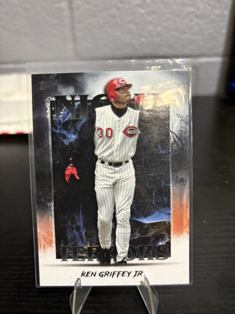Cincinnati Reds Ken Griffey Jr. Topps "Night Terrors" baseball trading card, striking atmospheric action shot in protective sleeve, high quality rare collectible in clear display case for serious baseball fans and investors today.