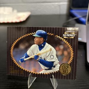 Premium 1990s Pinnacle Summit Ken Griffey Jr baseball card featuring a unique gold foil aesthetic of the Seattle Mariners icon in his legendary batting stance.