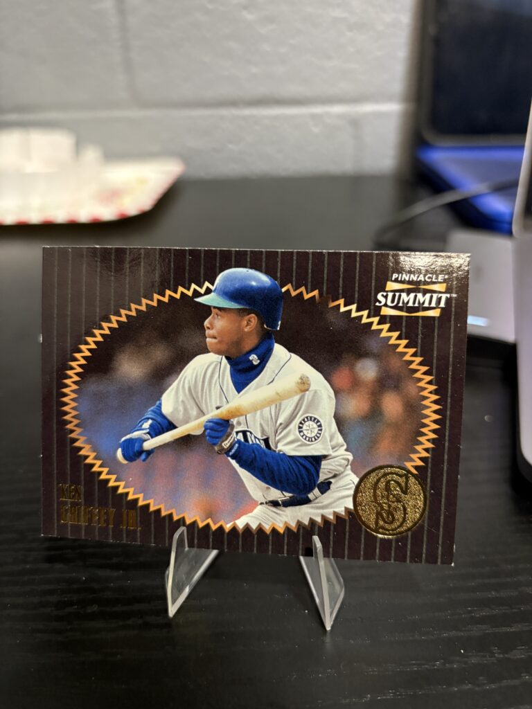 Premium 1990s Pinnacle Summit Ken Griffey Jr baseball card featuring a unique gold foil aesthetic of the Seattle Mariners icon in his legendary batting stance.