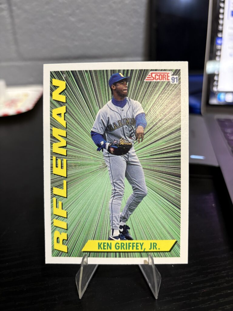 1991 Score Rifleman Ken Griffey Jr baseball card featuring the legendary Seattle Mariners outfielder in a vibrant green stylized design perfect for any sports trading card enthusiast.