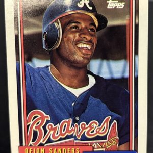 Vintage Topps Deion Sanders baseball card featuring the dual-sport legend in his Atlanta Braves uniform, perfect for collectors aiming to build their personal sports memorabilia wealth today.