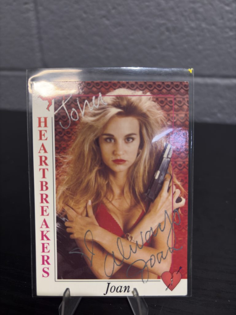 Collectible Heartbreakers trading card featuring Joan, a vintage lifestyle card perfect for enthusiasts looking to expand their unique personal collections and manifest financial growth today.