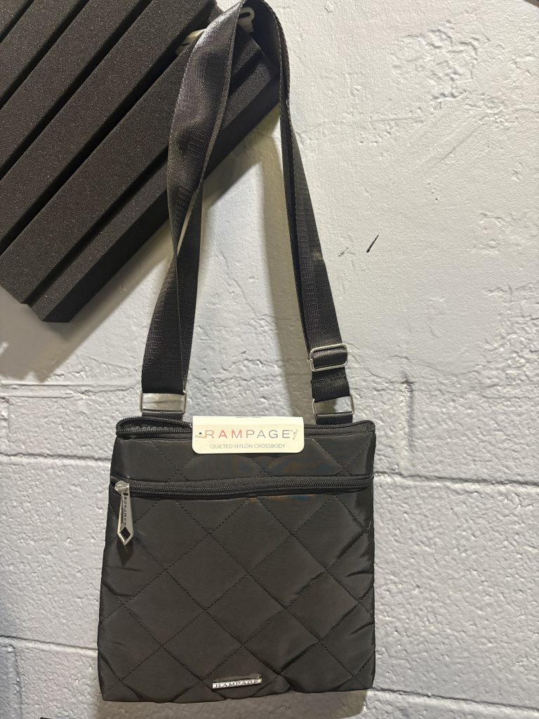 Brand new Rampage quilted nylon crossbody bag in black, a stylish and practical accessory for fashion enthusiasts looking to add functional, high-value assets to their collection today.
