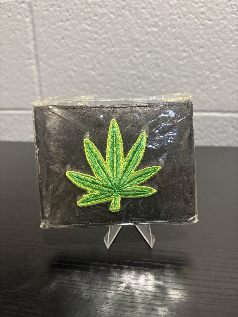 Brand new black leather wallet featuring a vibrant embroidered green leaf design, a classic accessory for enthusiasts looking to add functional, high-value assets to their collection today.