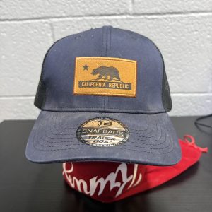 California Republic "Trader Bos" snapback cap in navy, a stylish and iconic regional souvenir accessory perfect for collectors building high-value, unique assets today.