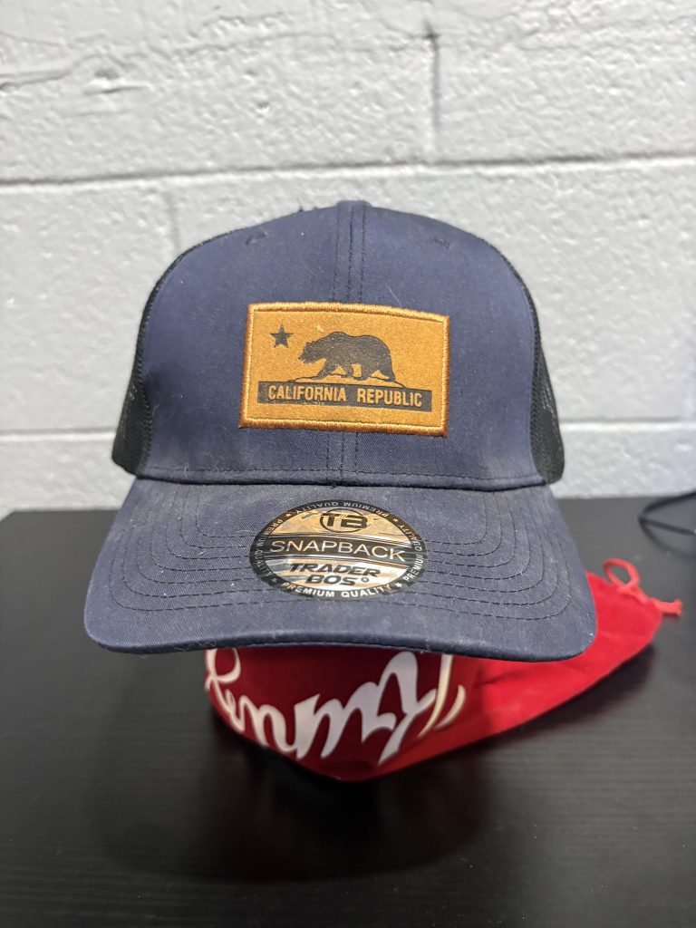 California Republic "Trader Bos" snapback cap in navy, a stylish and iconic regional souvenir accessory perfect for collectors building high-value, unique assets today.
