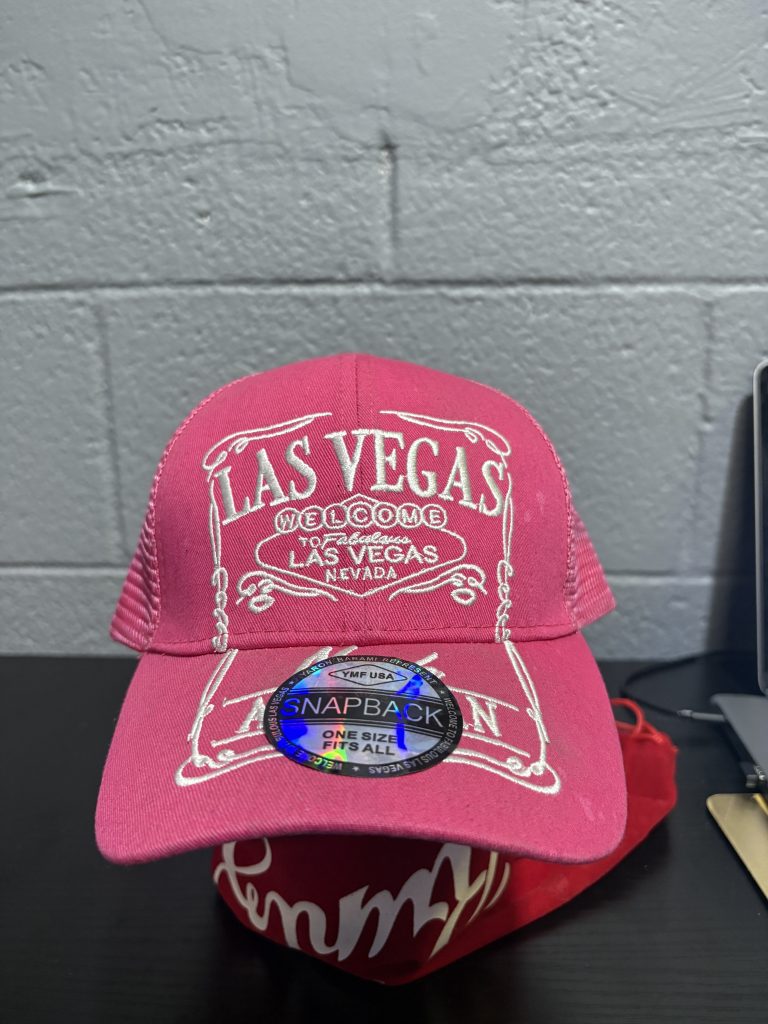 Vibrant pink Las Vegas "Welcome to Fabulous" snapback cap, a high-energy souvenir and collectible accessory for those adding prosperity to their portfolio today.