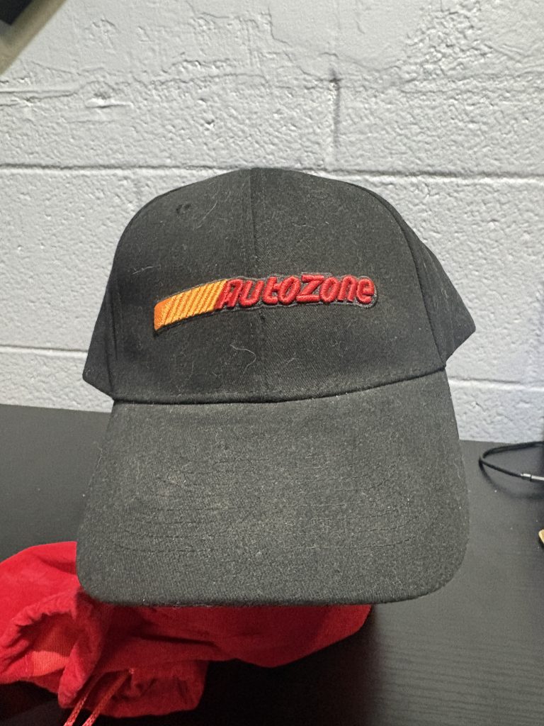 Classic black AutoZone embroidered baseball cap, a functional and recognizable accessory for automotive enthusiasts looking to add practical, high-value assets to their collection today.