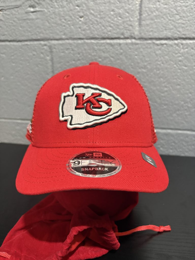 Authentic Kansas City Chiefs NFL New Era 9FIFTY low profile snapback cap in iconic team red, a championship-level accessory for sports fans looking to add high-value, authentic gear to their collection today.