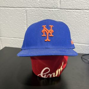 Classic New York Mets MLB New Era cap in iconic royal blue and orange, a must-have for sports fans and collectors building a high-value, professional-grade wardrobe today.
