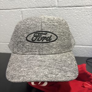 Sleek grey heathered Ford baseball cap with an embroidered logo, a classic and professional accessory for automotive enthusiasts building a high-value, functional collection today.