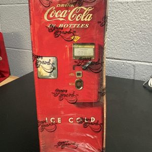 1996 Coca-Cola "Score Board" vintage-style vending machine collectible card box, factory sealed, perfect for Coca-Cola collectors and trading card enthusiasts looking to add high-value, nostalgic assets to their collection today.