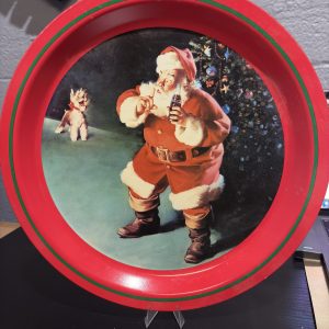 Vintage Coca-Cola Christmas serving tray featuring a classic Santa Claus and dog illustration, a nostalgic collectible for enthusiasts looking to add timeless, high-value decor to their portfolio today