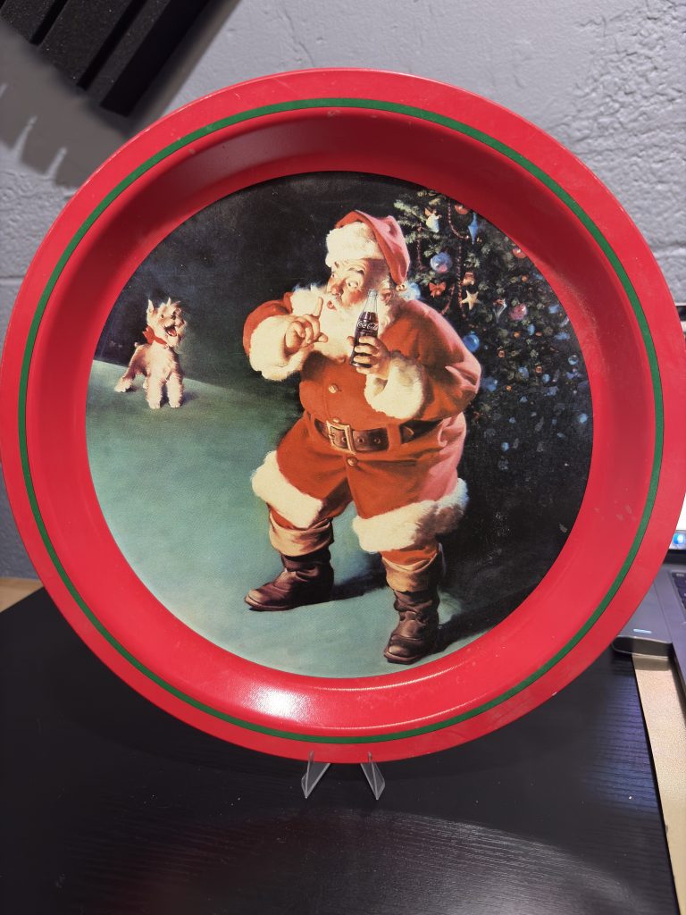 Vintage Coca-Cola Christmas serving tray featuring a classic Santa Claus and dog illustration, a nostalgic collectible for enthusiasts looking to add timeless, high-value decor to their portfolio today