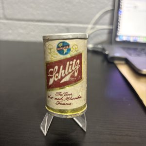 Vintage Schlitz miniature beer can "The Beer That Made Milwaukee Famous," a charming and rare breweriana collectible for enthusiasts looking to add unique, high-value assets to their collection today.