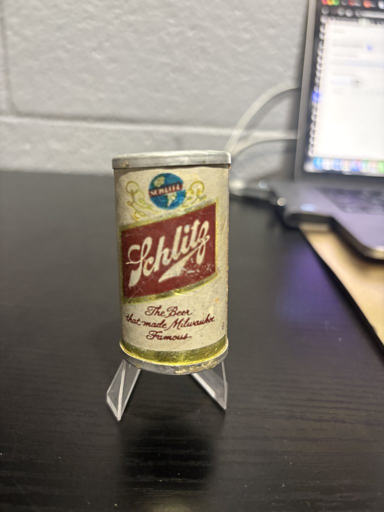 Vintage Schlitz miniature beer can "The Beer That Made Milwaukee Famous," a charming and rare breweriana collectible for enthusiasts looking to add unique, high-value assets to their collection today.