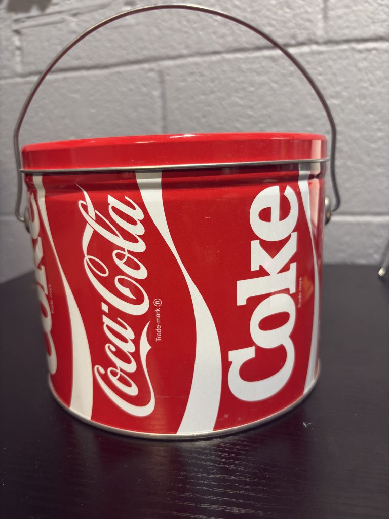 Classic red Coca-Cola "Coke" metal bucket with handle, a perfect retro-style storage or display piece for Coca-Cola collectors looking to add authentic, high-value brand merchandise to their collection today.