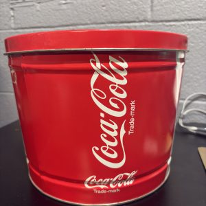 Vintage Coca-Cola branded metal tin, repurposed for "Snack Bonanza," a nostalgic and highly collectible piece for enthusiasts building a unique, high-value asset portfolio today.