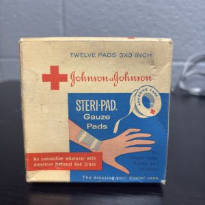 Rare vintage Johnson & Johnson "Steri-Pad" gauze pads box, a fascinating piece of mid-century medical history perfect for collectors of antique health and apothecary memorabilia.