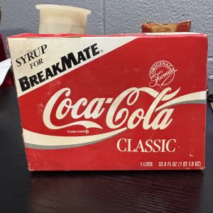 Rare vintage Coca-Cola Classic "BreakMate" dispenser syrup refill package, a highly sought-after piece of mid-century soda fountain memorabilia perfect for serious collectors looking to add high-value, authentic assets to their portfolio today.
