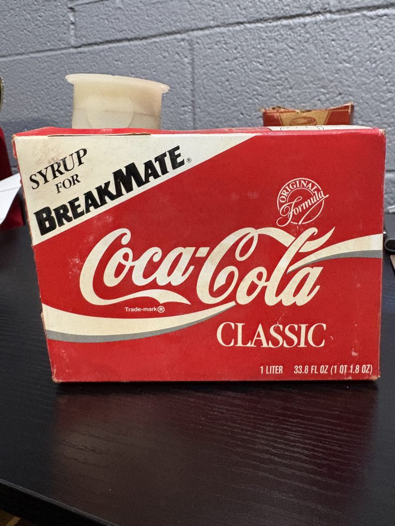Rare vintage Coca-Cola Classic "BreakMate" dispenser syrup refill package, a highly sought-after piece of mid-century soda fountain memorabilia perfect for serious collectors looking to add high-value, authentic assets to their portfolio today.