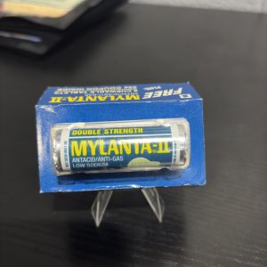 1989 vintage Mylanta-II promotional pack containing 8 chewable tablets and a coupon, an exceptional pharmaceutical collectible for investors adding high-vibration medical memorabilia to their portfolio.
