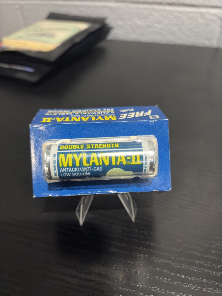 1989 vintage Mylanta-II promotional pack containing 8 chewable tablets and a coupon, an exceptional pharmaceutical collectible for investors adding high-vibration medical memorabilia to their portfolio.
