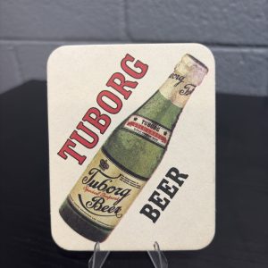 Set of 2 vintage Tuborg Gold Label beer coasters, a high-vibration collectible perfect for breweriana enthusiasts looking to manifest prosperity and add authentic brand history to their portfolio.