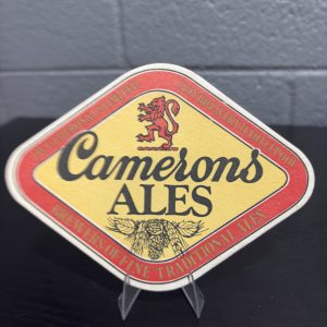 Set of 3 vintage "Camerons Ales" diamond-shaped coasters from Lion Brewery, Hartlepool, a high-vibration collectible perfect for enthusiasts of traditional British ale history looking to manifest prosperity today.
