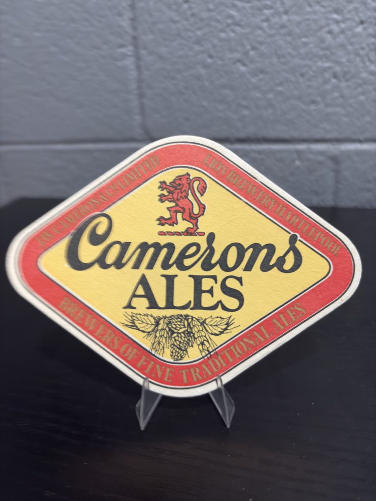 Set of 3 vintage "Camerons Ales" diamond-shaped coasters from Lion Brewery, Hartlepool, a high-vibration collectible perfect for enthusiasts of traditional British ale history looking to manifest prosperity today.