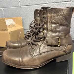 Pre-owned women's BX by Bronx distressed brown leather combat-style boots with lace-up design and decorative buckle, a stylish, high-vibration wardrobe essential perfect for manifesting confidence and prosperity.