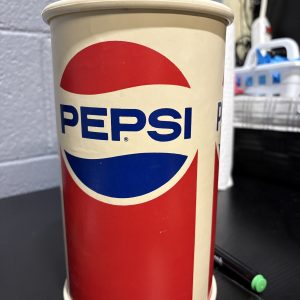Vintage Pepsi-Cola branded "REUSABLE BANK" promotional coin container, a high-vibration collectible perfect for enthusiasts of vintage soda memorabilia looking to manifest prosperity today.