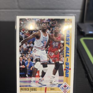Vintage 1991 Upper Deck Patrick Ewing "East All-Star" trading card, a master-number 11 frequency collectible for basketball enthusiasts focused on historic excellence and visionary performance on the game's biggest stages.
