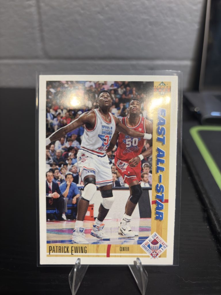 Vintage 1991 Upper Deck Patrick Ewing "East All-Star" trading card, a master-number 11 frequency collectible for basketball enthusiasts focused on historic excellence and visionary performance on the game's biggest stages.